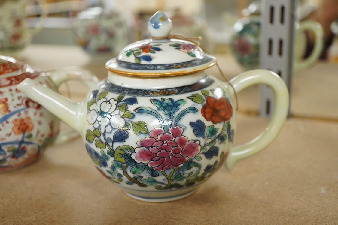 Three 18th century Chinese porcelain European enamelled teapots and covers, tallest - 13cm high